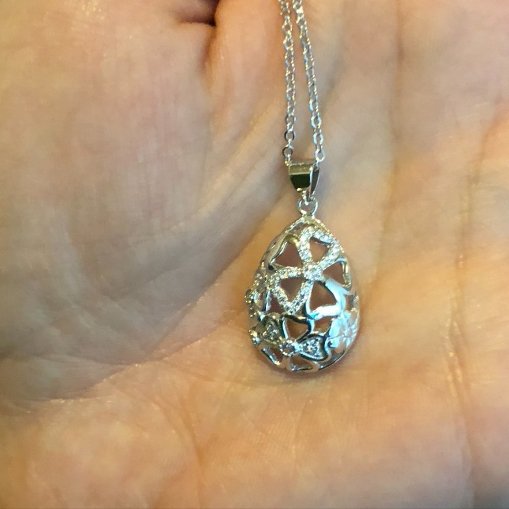 Sterling Silver Neckace with Floral Oval Shaped Pendant